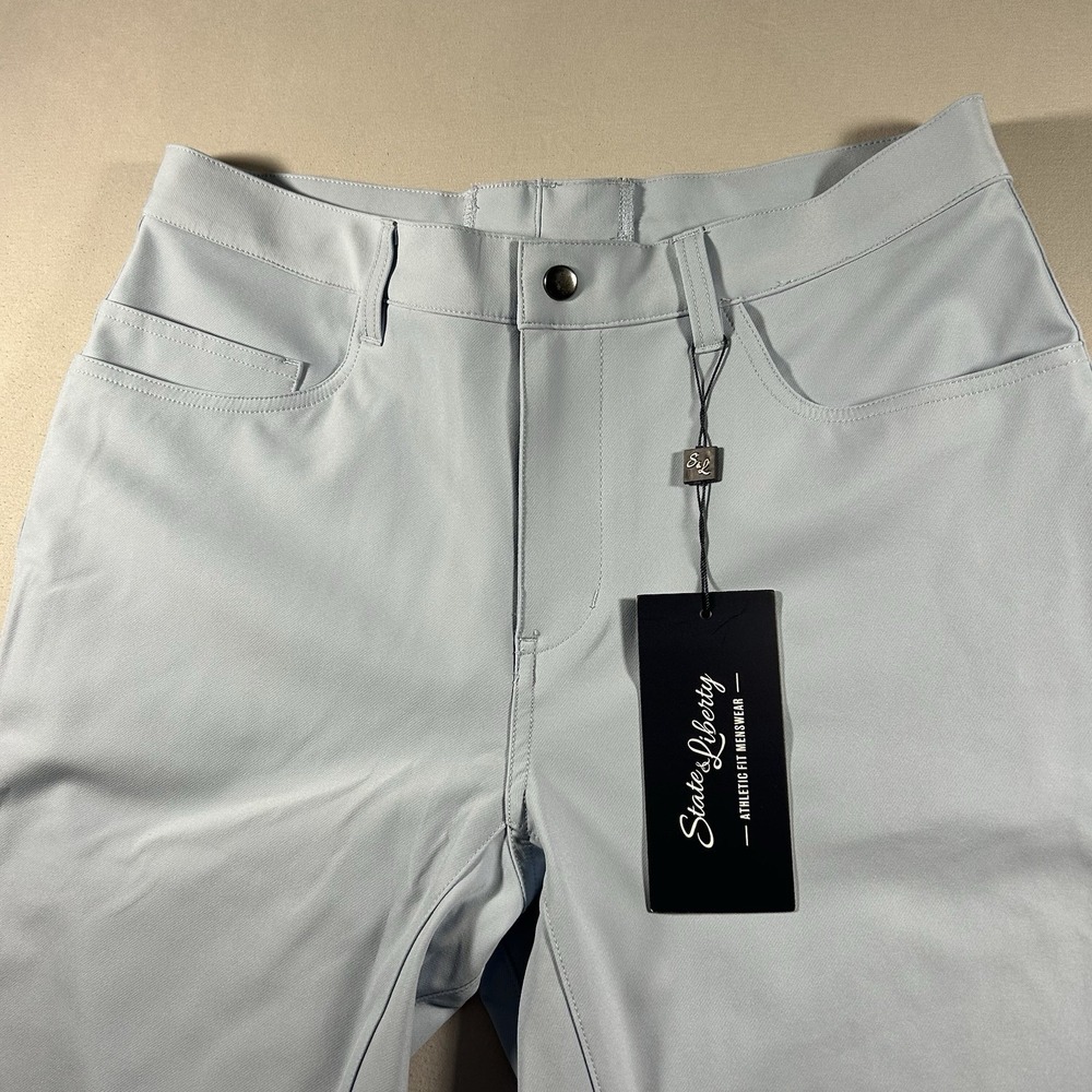 State and Liberty Mens Athletic Fit Stretch Tech Chino Pants Light Blue 33x30